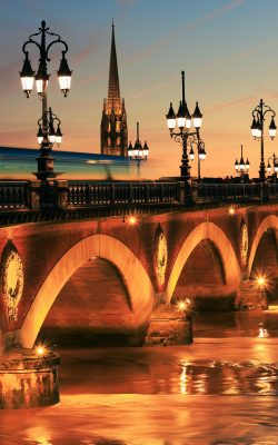 pont de pierre bridge with st michel cathedral, bordeaux, france